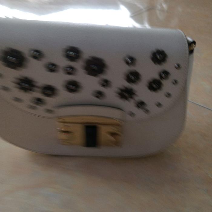 Tas selempang wanita merk DONINI Original kulit bekas pakai masih seperti baru
