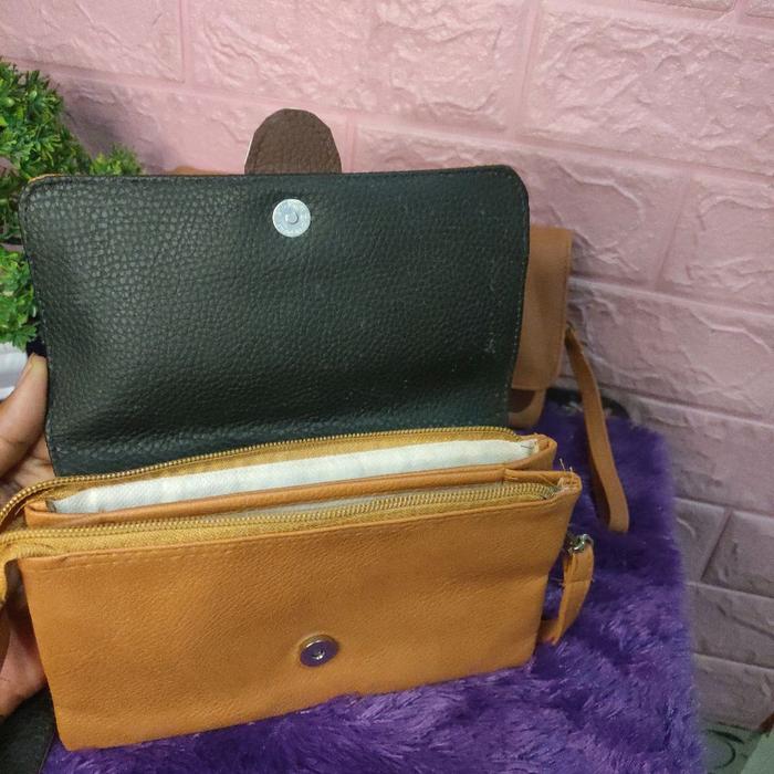 dompet hp asesoris dilengkapi tutup pengunci magnet