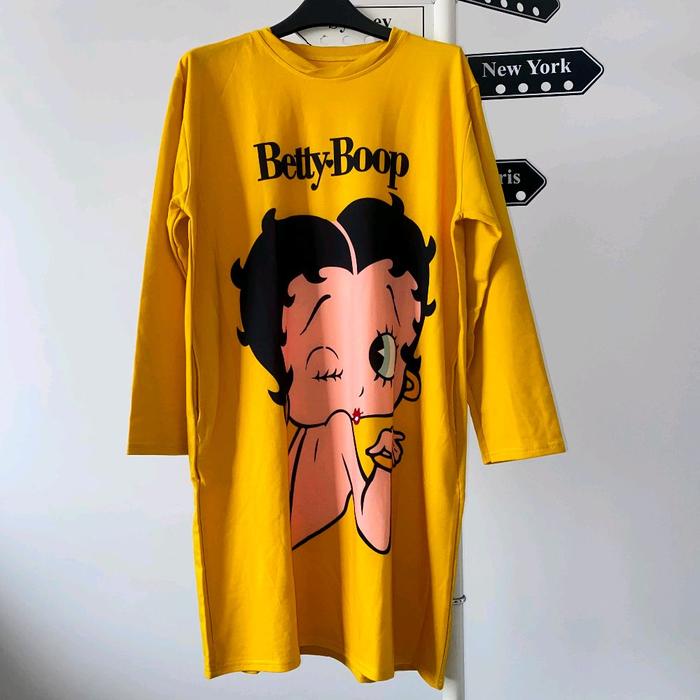 Tunik Betty Boop Kuning dengan Desain Karakter Lucu dan Menarik