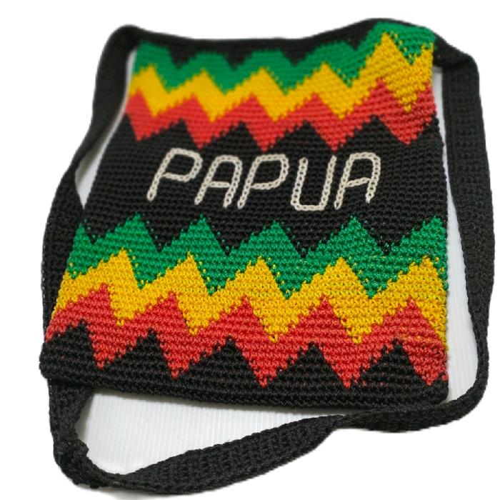 Tas cangklong dari Papua bahan rajutan, warna , hijau ,kuning, merah dan hitam warna reggae