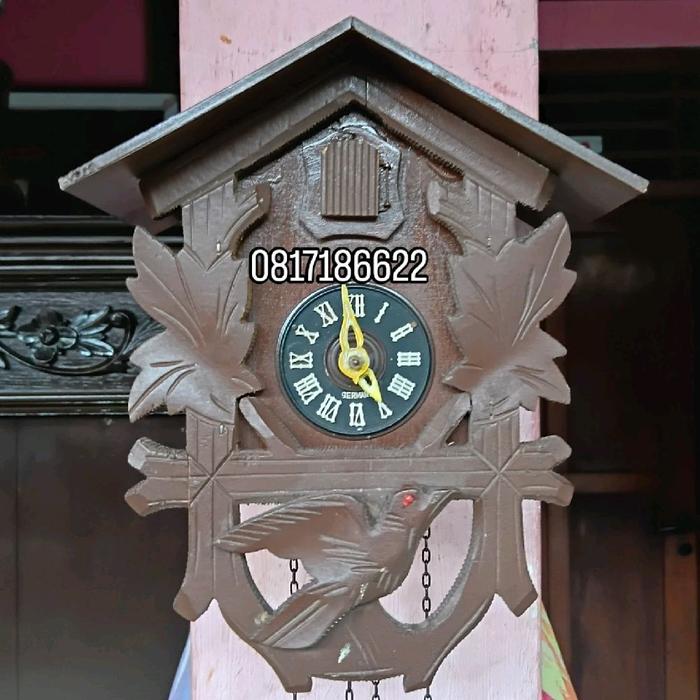 jam kikuk burung madein germany antik masih normal