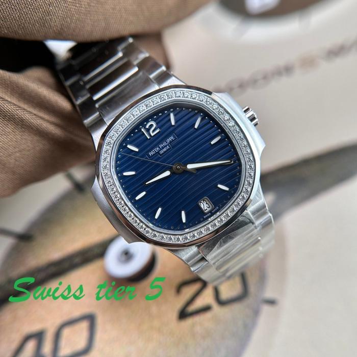 Jam Tangan WanitaPatekPhilippe Nautilus 7118 Replica Watch Blue Dial Stone Bezel 35mm