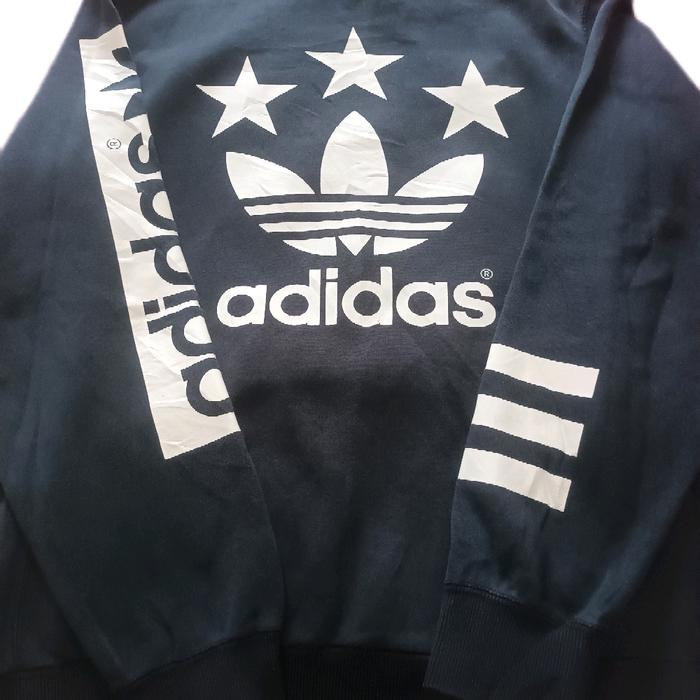 Adidas Jaket Olahraga Hitam dengan Logo Bintang dan Tiga Garis Putih untuk Pria
