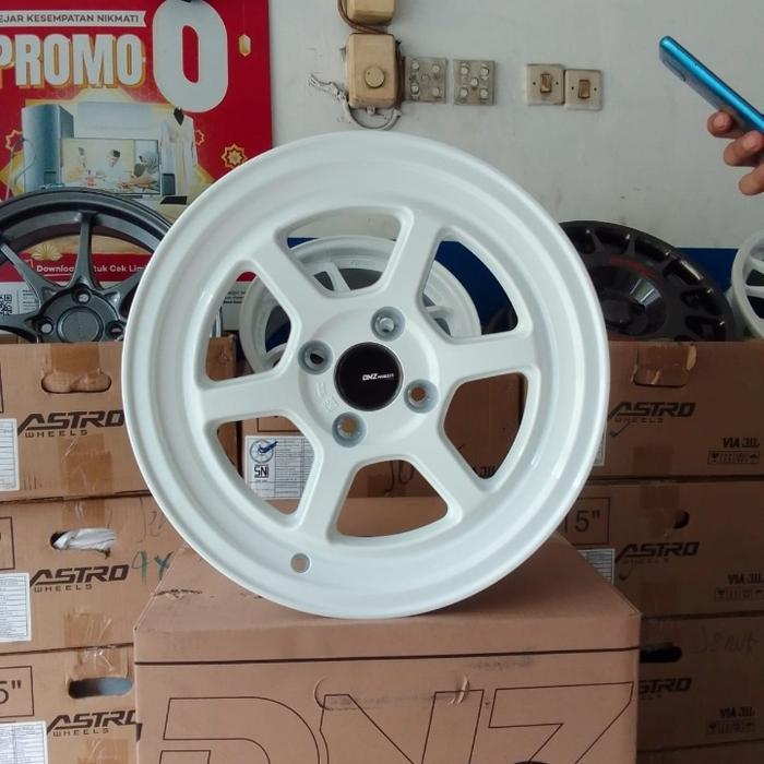 Terlaris Velg Mobil Dnz Roku 15X7.0 Pcd 4X100 Et.38 Racing White Ready