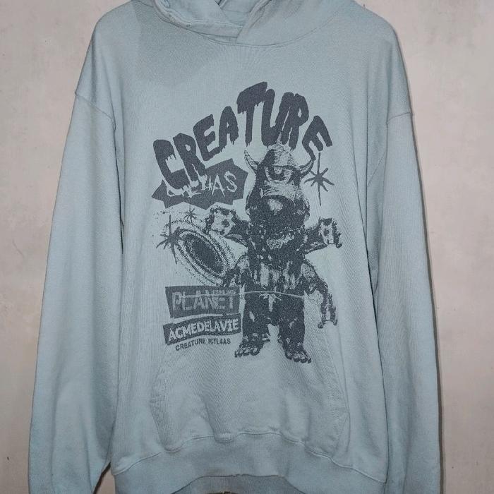 Hodie ADLV Hoodie dengan Desain Creature Has Planet ACMEDELAVE untuk Gaya Santai Anda