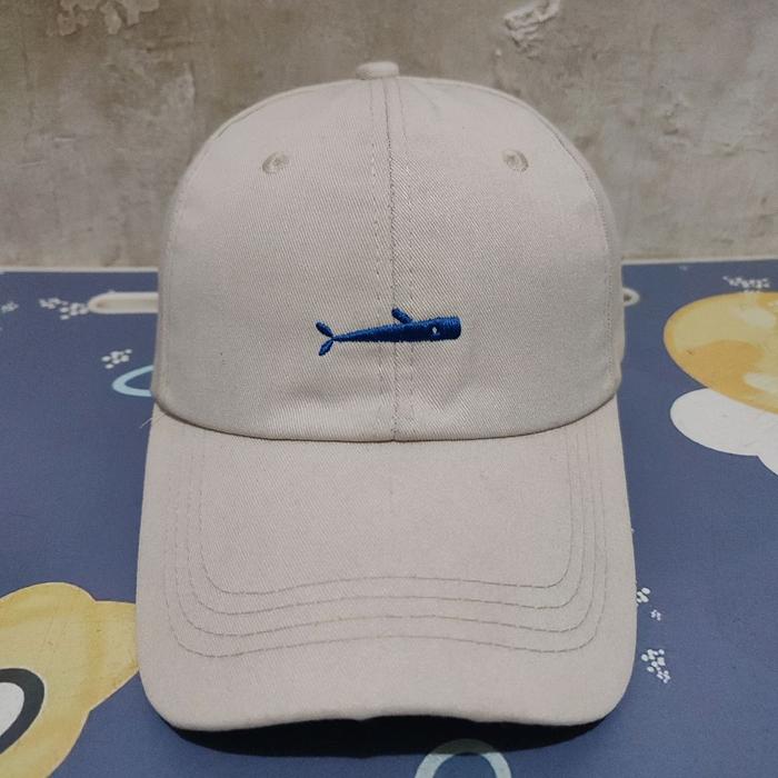 Topi Caps Logo ikan Cream