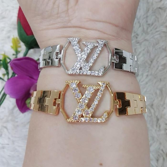 Gelang Tangan Model Tali Jam Permata Tengah kombinasi logo warna silver dan gold  Perhiasaan penggan