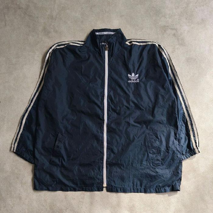 Jaket windbreaker olahraga pria Adidas trifoil navy bekas