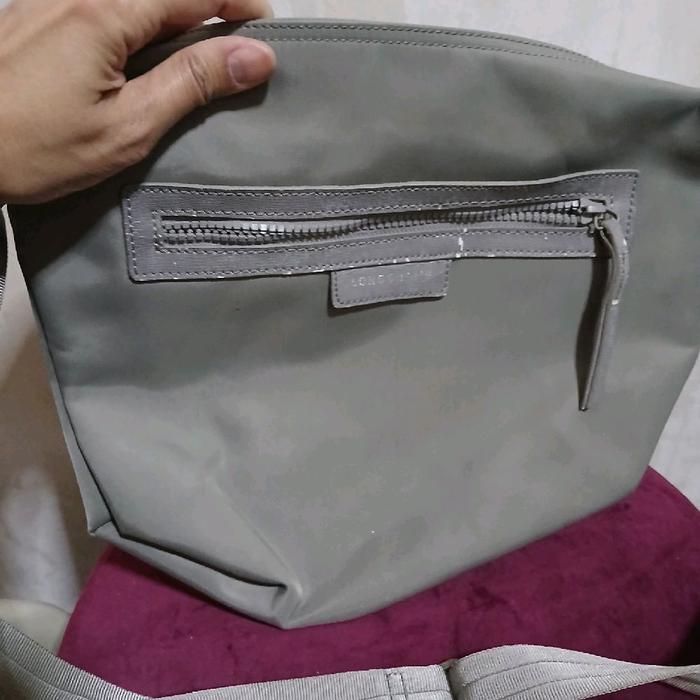 longchamp sling light grey .