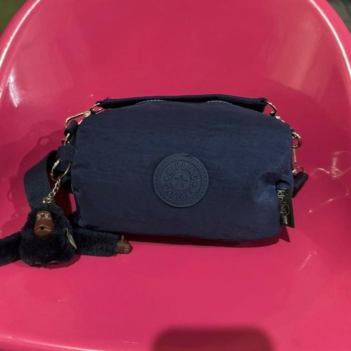 Kipling Tas Selempang Biru Wanita Kanvas Original Elegan Ikonik Tahan Air Crinkled Nylon Logo Bulat 