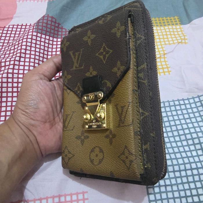 preloved tas hp kulit asli. multi fungsi, talpan rantai