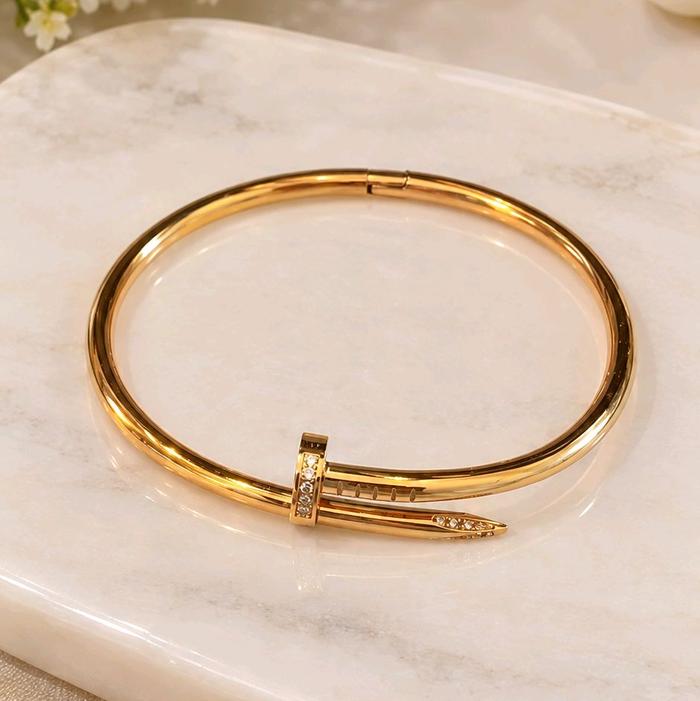 gelang paku titanium