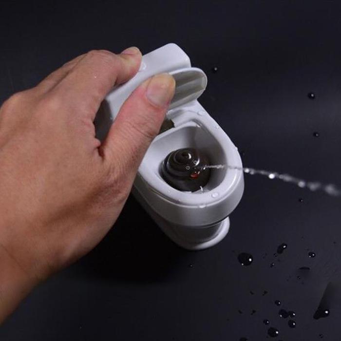 Novel Interesting Poop Spray Prank Toy Joke Cary Toy Mini Sprinkler