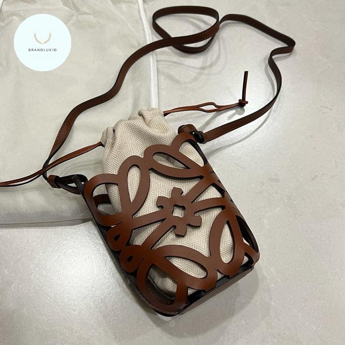 Loewe anagram cut out drawstring pocket bag in tan