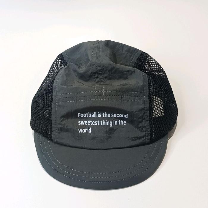 Topi visor pendek stone Grey football is the second
