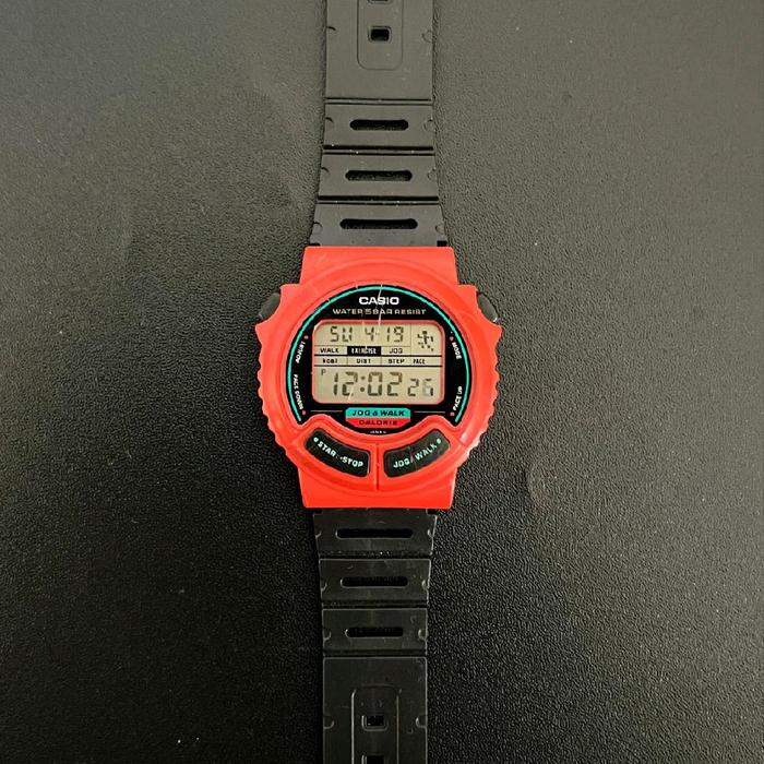 Casio JC 11 Bullhead Watch - Jam Tangan Digital dengan Tampilan Merah dan Tali Hitam