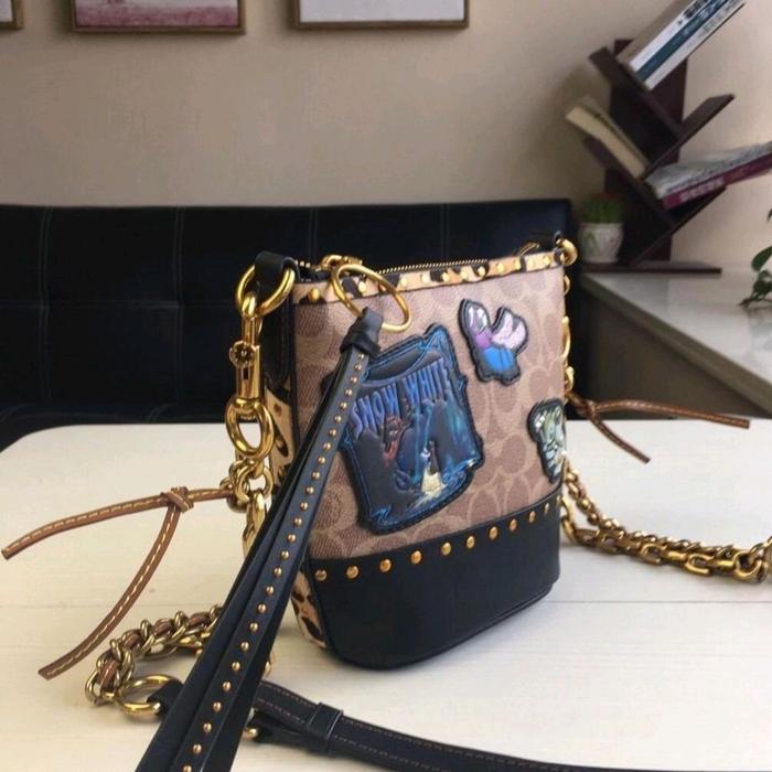 COACH X DISNEY DUFFLE 12 IN SIGNATURE PATCHWOR Selempang