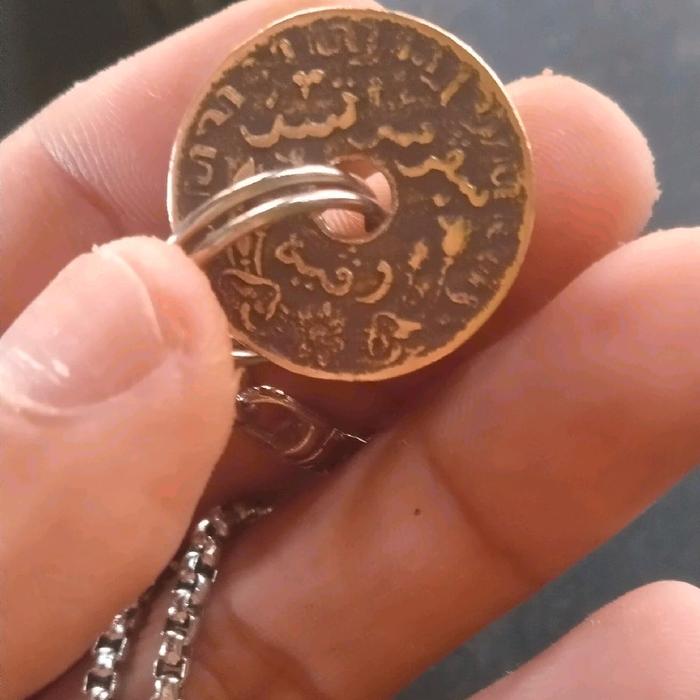 kalung perak murni dengan buah kalung uang sen kuno jaman belanda asli.