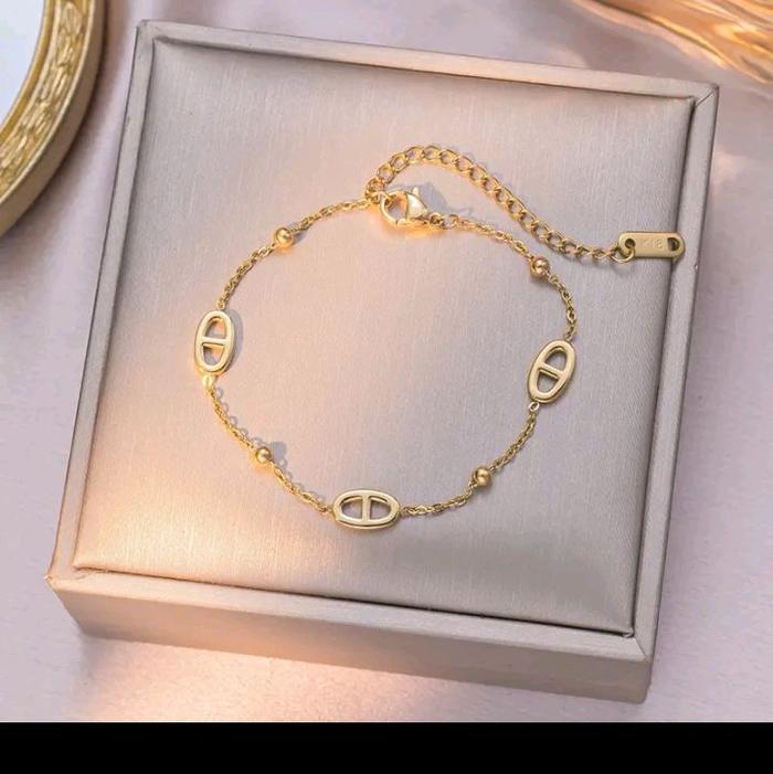 gelang cd model bolong titanium