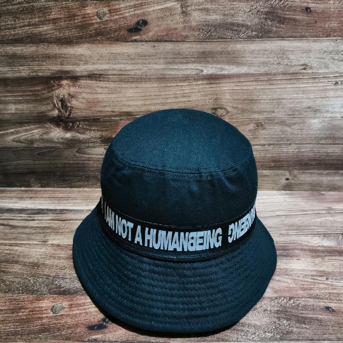 topi bucket hat iam not a human being logo black