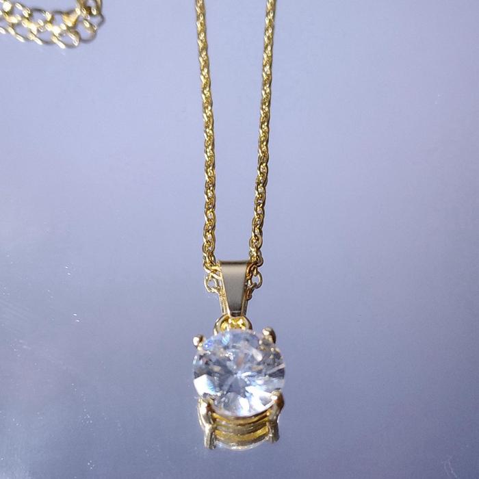 Kalung titanium liontin mutiara