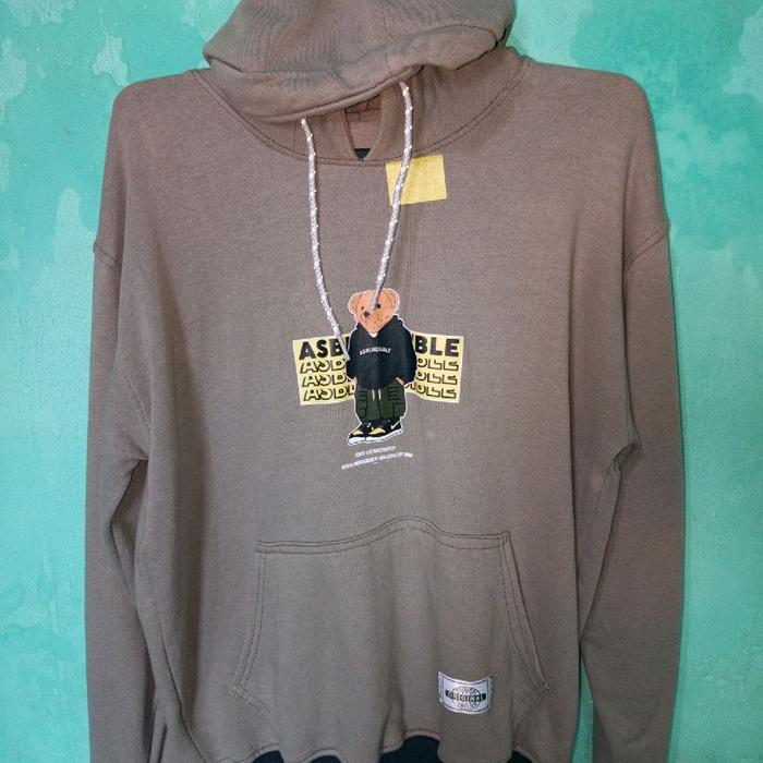 Hoodie Assemble Essential dengan Desain Beruang dan Tulisan "Assemble" - Warna Coklat