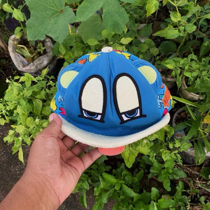 Elsntiko Topi Anak Skena Brand Original dengan Desain Wajah Lucu dan Warna Biru Cerah