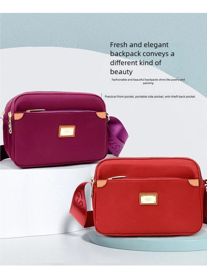 WESIE Tas Selempang Wanita Model 217-2 Warna Ungu dengan Rantai Logam Harga Murah Import Series Olah