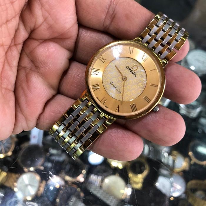 Omega Jam Tangan Pria Quartz OMG Kombinasi Warna Klasik Solid Steel Tampilan Elegan dan Modern