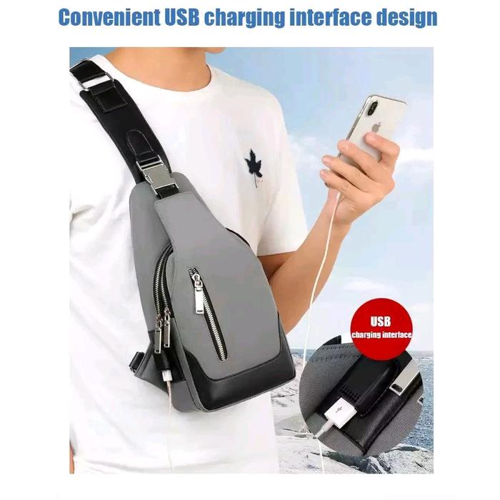 TAS SELEMPANG PRIA GRATIS DOMPET,JAM, HEADSET,USB PORT
