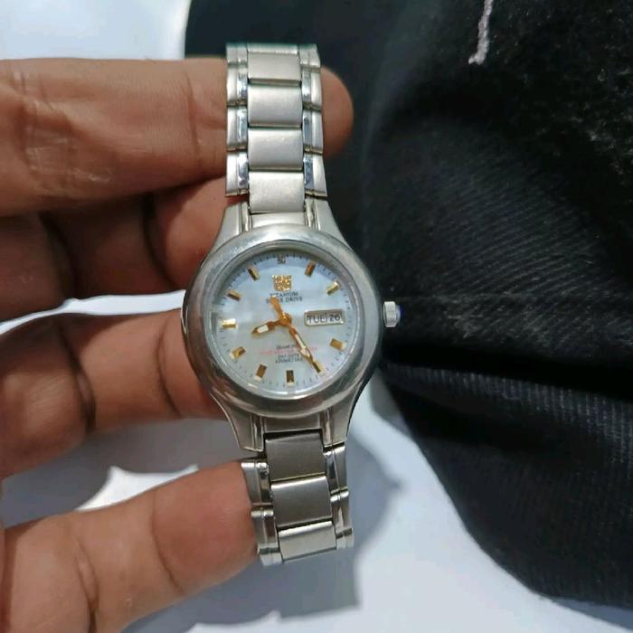 Elgin ja871 Jam Tangan Analog Perempuan Tali Titanium Stainless Steel Dial Putih Elegan dan Tahan La