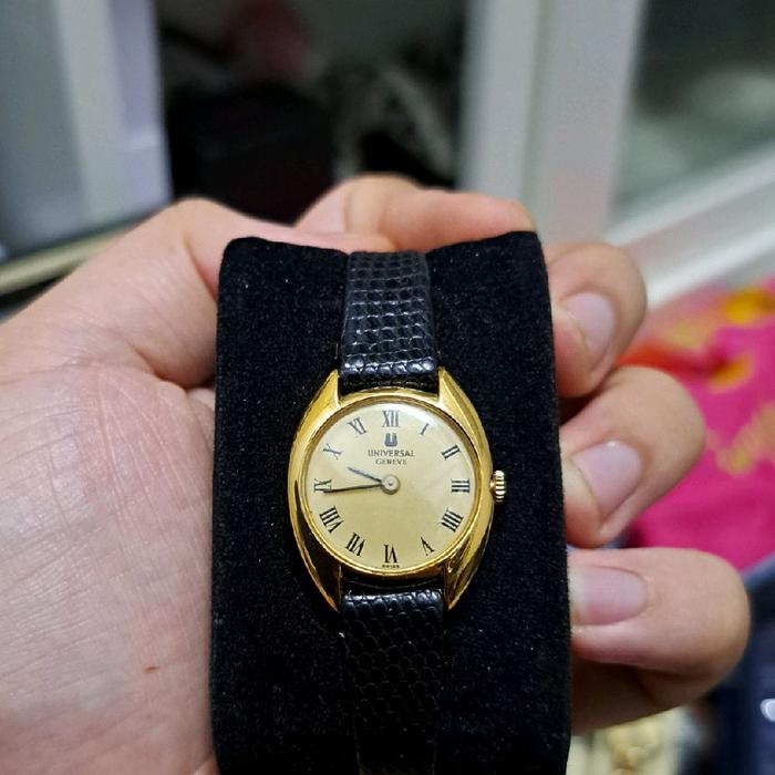 jam tangan universal geneve ladies c shaped gerald genta 20k gold plated ( gp ) swiss movement manua