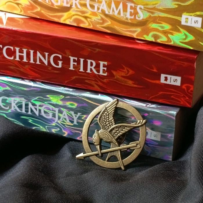 THE HUNGER GAMES PIN/MOCKINGJAY PIN