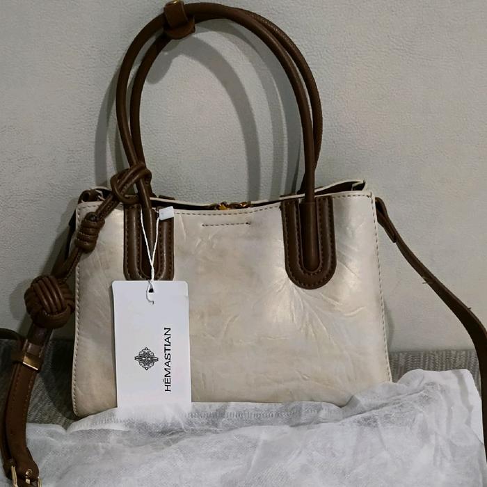 Tas wanita slempang hemastian warna gold gradasi
