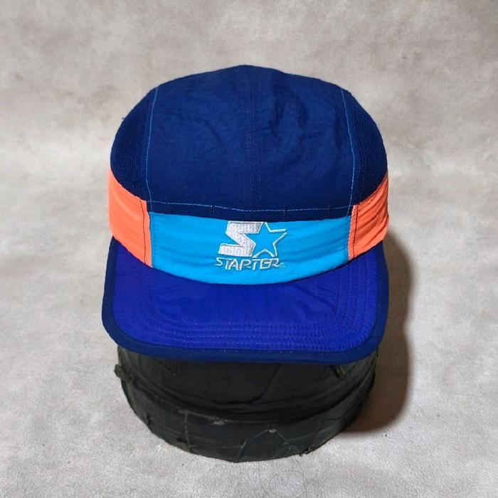 Topi 5 flannel starter multi colour bekas