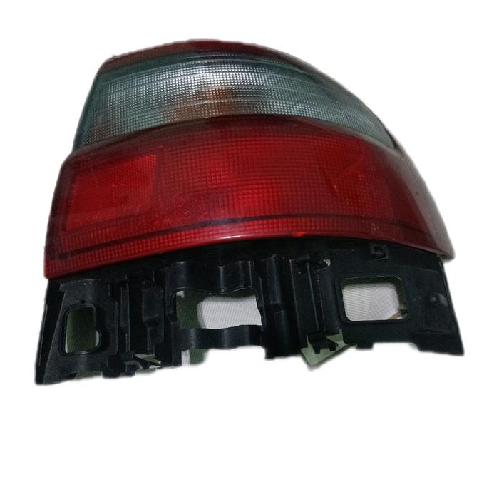 Lampu stop/ stop lamp Corona absolute kanan 93- 96 asli ada rengat dalam tapi kondisi bagus