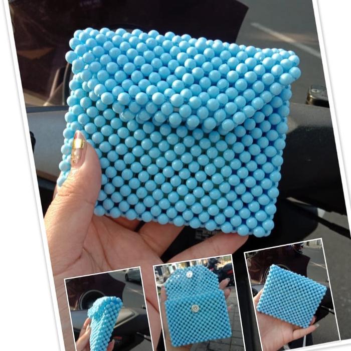 Dompet mote/manik mote susu