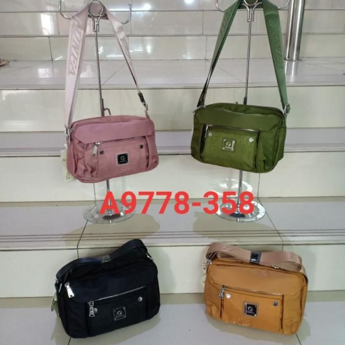 Tas Selempang Tas wanita Junfa 9778-358 Bahan Parasut Tebal. Tas Junfa Tas Selempang Junfa Best Sell