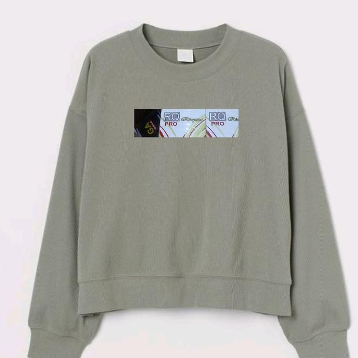 sweatshirt hijau dengan desain rq pro di depan dan bahannya bagus