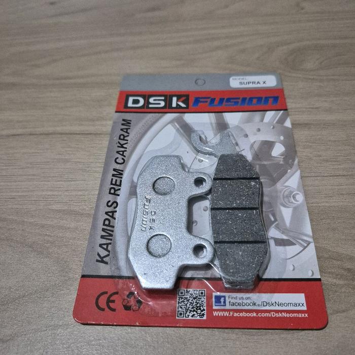 Dispad depan motor supra x