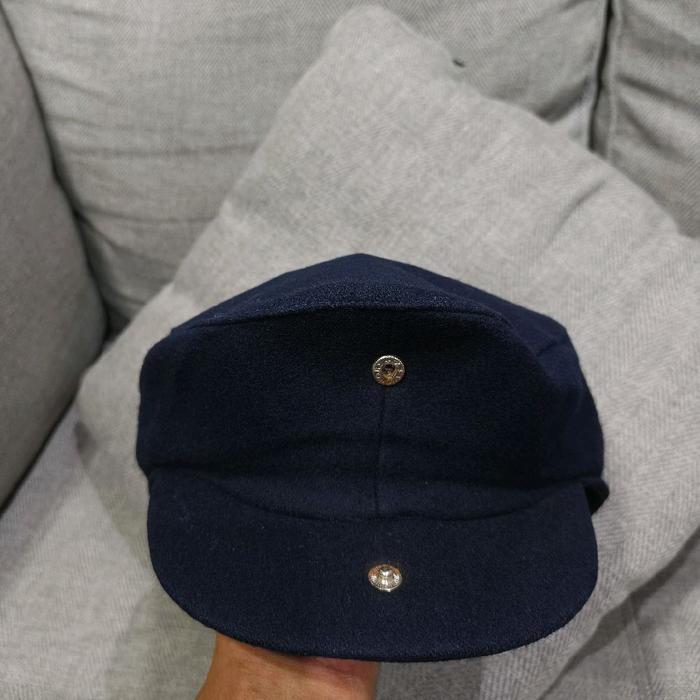 topi driver copet bahan wool