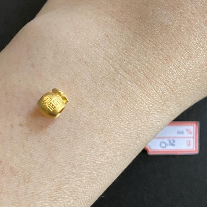 Gelang kantong uang berat : 0,32gr emas 99,9% (24k)