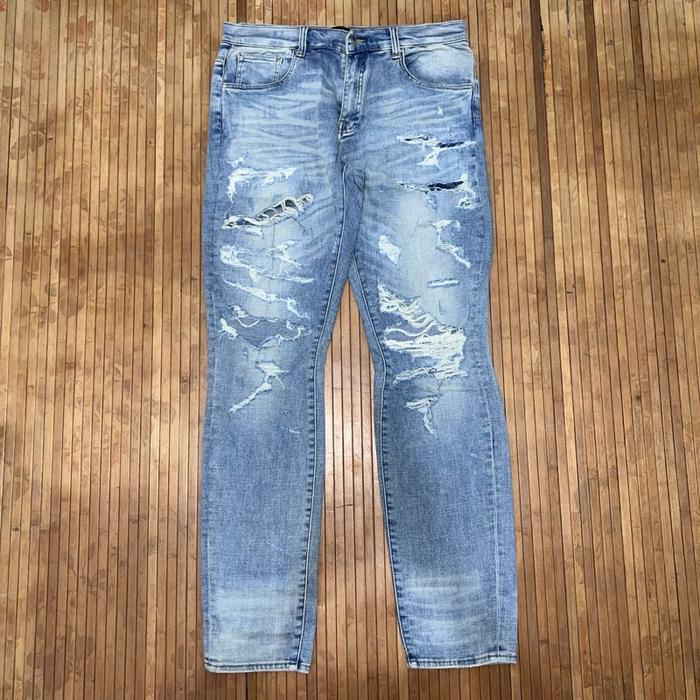 AMIRI STRETCH DISTRESSED RIPPED JEANS philipp plein balmain