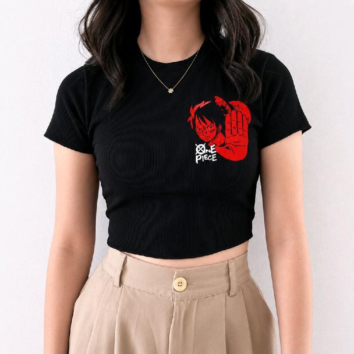 Kaos Anime One Piece Putih dengan Desain Tangan Merah dan Tulisan "One Piece"