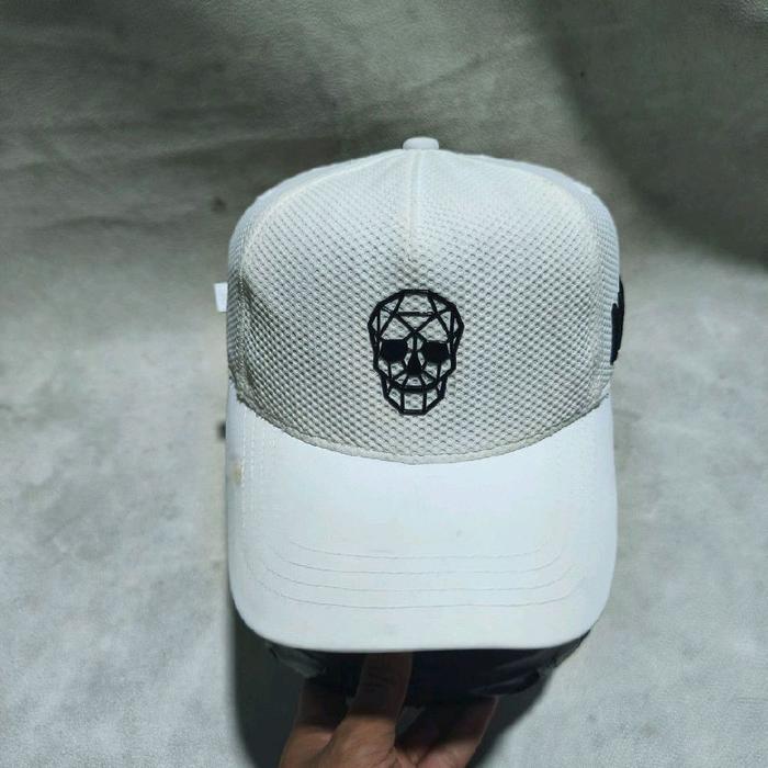 Topi olahraga golf amazing core putih skull bekas
