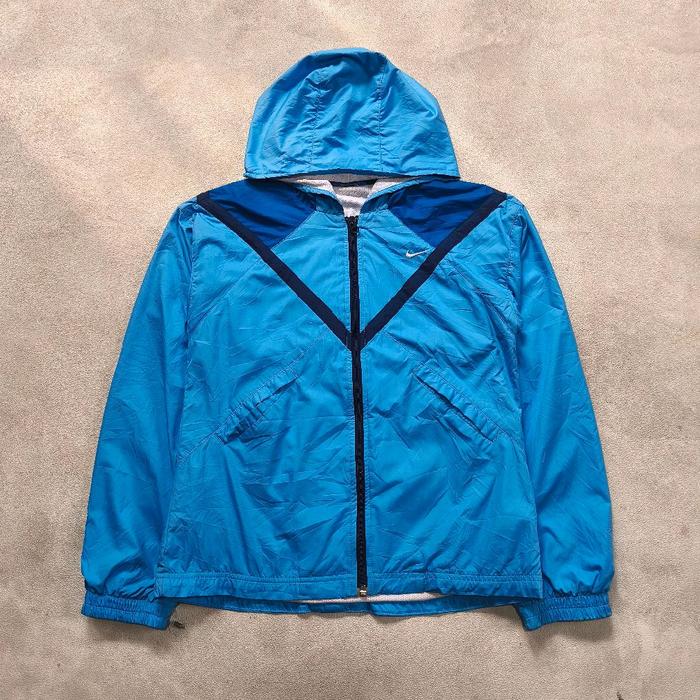 Jaket windbraker Nike biru bekas