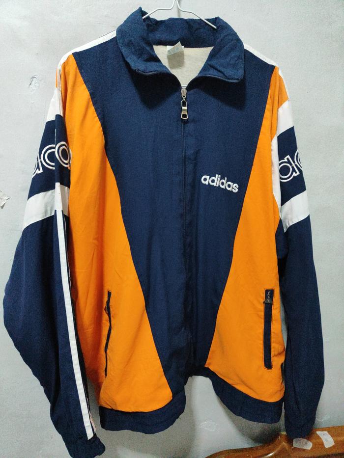 Adidas Jaket Vintage Pria Warna Navy dan Orange Dengan Desain Sporty dan Nyaman