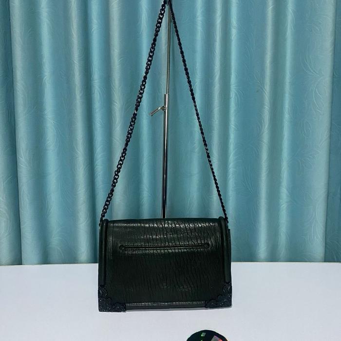 A McQueen** tas sling bag