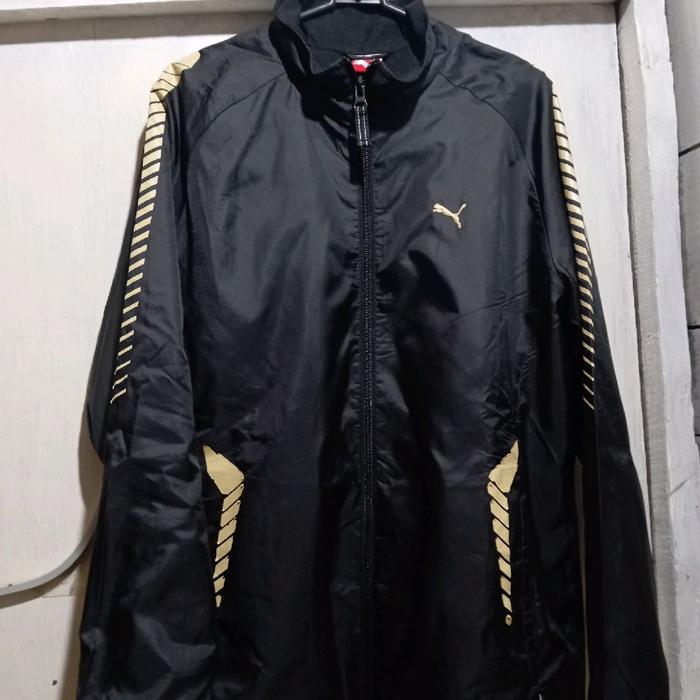 Jaket second puma hitam lis gold