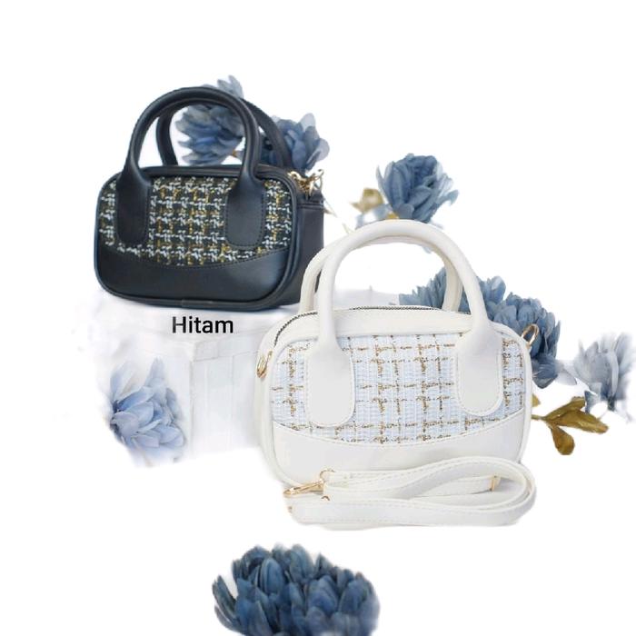 Merek: Velyn Bag (oleh Jims Honey).  Konten & Penggunaan:  Konten: Tas selempang/sling bag. Pengguna